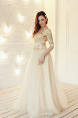 Fototapeta premium beautiful bride in a chic wedding dress