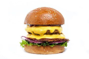 Juicy burger of beef with cheese, onion, potatoes and salad on a white background. Side view