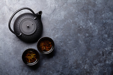Obraz na płótnie Canvas Tea cups and teapot