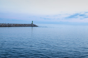 Port lighthouse in a fishing village