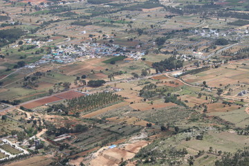 Fototapeta na wymiar Small village captured from 500 meters above the ground