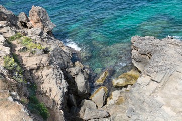 Fototapeta na wymiar Mallorca rocky coast with sea and waves