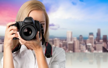 Woman-photographer takes images, isolated