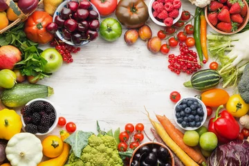 Foto op Canvas Healthy living, summer fruits vegetables berries arranged in a frame. Organic produce, raw eating, copy space, top view, selective focus © Liliya Trott