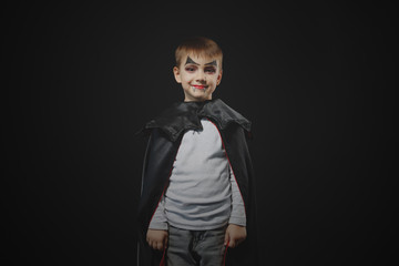 Halloween vampire boy portrait in studio