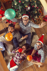 Blowing balloons on a Christmas morning