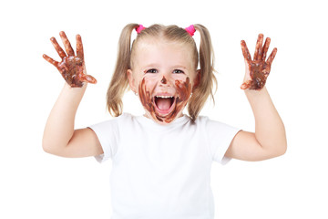 Happy little girl in chocolate on white background