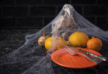 Halloween table setting with plate and web 