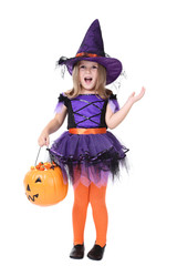 Young girl in halloween costume with pumpkin bucket on white background