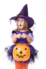Fototapeta premium Young girl in halloween costume with pumpkin bucket on white background