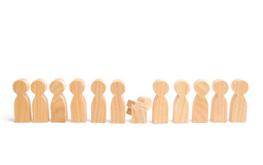 Weak player, worker for dismissal. A row of wooden people and a broken figure of a person among them. The concept of a weak link. Did not give up to expectations and did not fulfill the task.