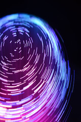 colored vortex effect created with fiber optic light source