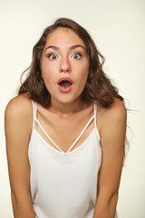 Portrait of surprised young woman