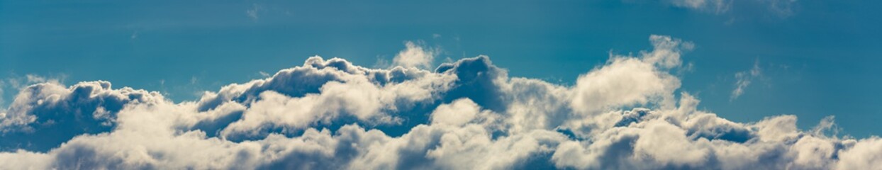 Pano of blue cloudy sky