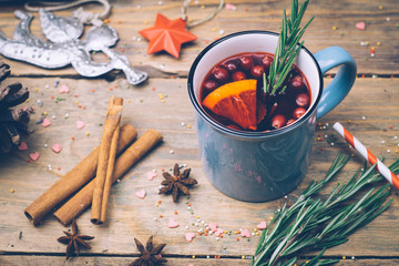 Christmas drink (winter hot drink). Mulled wine punch and spices for glintwine on vintage wooden table background top view. Copy space.