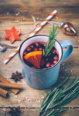 Christmas drink (winter hot drink). Mulled wine punch and spices for glintwine on vintage wooden...