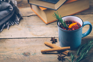 Christmas drink (winter hot drink). Mulled wine punch and spices for glintwine on vintage wooden table background top view. Copy space.