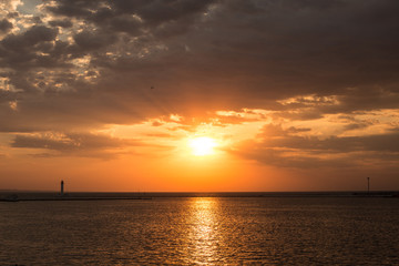 dawn overlooking the sea and the horizon in the summer in the port of Odessa