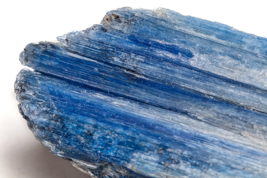 Macro mineral stone Kyanite a white background