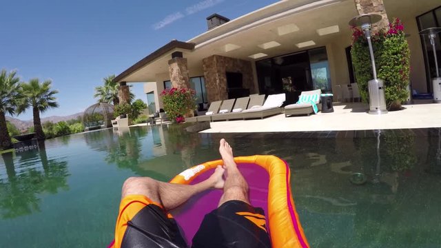 POV, relaxing in pool