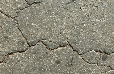 Cracked asphalt road texture