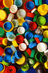 Secondary raw material. Multicolored caps from bottles, an excellent raw material for recycling.