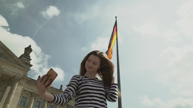 Girl taking selfies in Berlin