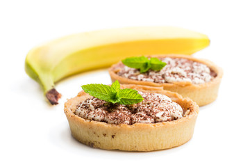 Mini  banoffee pie tarts isolated on white