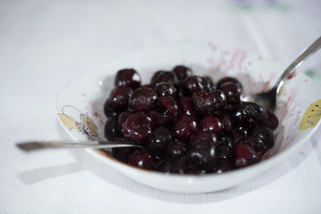 Clafoutis with Cherry. Red and ripe cherries. Preparation and close-up.