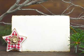 Christmas background with vintage photo frame and star ornament
