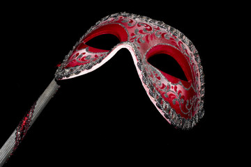 Venetian Masquerade Red and Silver Ball Mask on Black Background