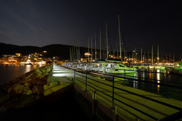 Fototapeta na wymiar Beautiful night bay in Europe with yachts and boats