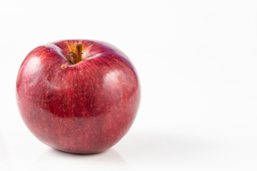 Tasty and ripe apple on the kitchen table. Sweet fruits from central europe.