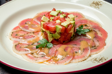 tuna carpaccio on a plate