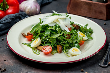salad with arugula and fried mushrooms