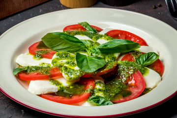 Caprese salad with mozzarella and tomato