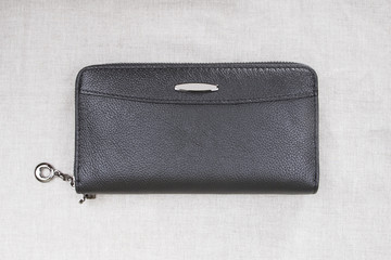 closed men's wallet; black purse
