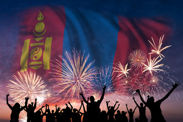 People are looking on fireworks and flag of Mongolia