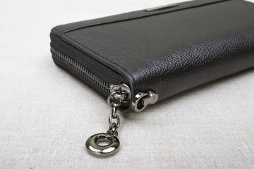 lightning on a purse close-up; closed black purse