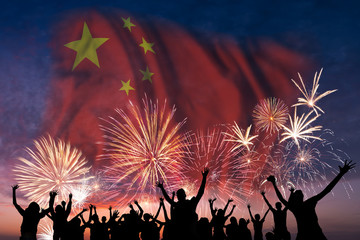 People are looking on fireworks and flag of Republic of China