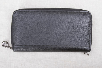 male black wallet; closed purse