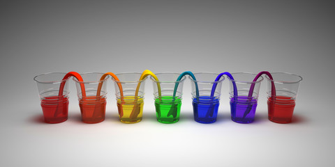 Rainbow walking water experiment on empty background. Concept of science. Glasses in row with colored water and wet paper between.