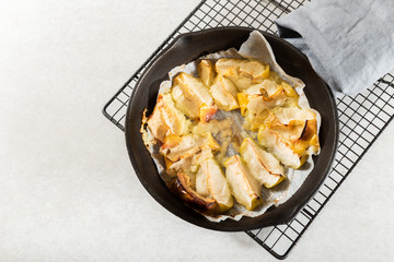 Stewed Apple with Cinnamon, baked in the oven in the iron pan
