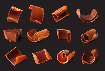 Realistic chocolate pieces and shavings. Vector illustration isolated on white background. Ready for your design. EPS10.