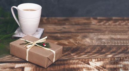 Christmas composition with gift and coffee