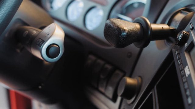 DAF XF Truck Interior Driving Cabin . Pan left close shot. DAF XF truck radio and automatic gear. 4k footage