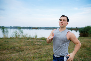 Fototapeta premium Sport and fitness runner man doing outdoors training for marathon run.