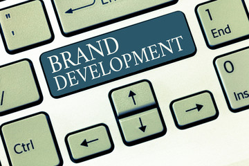 Conceptual hand writing showing Brand Development. Business photo showcasing Defining the product...