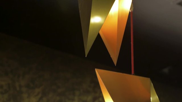 Customized anodized gold steel origami inspired pendant LED lights in angular folded shapes