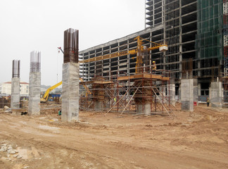 Reinforcement concrete column as part of building structure at the construction site. Reinforcement...